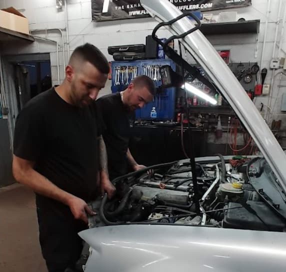 The Frank's Auto crew working in the shop