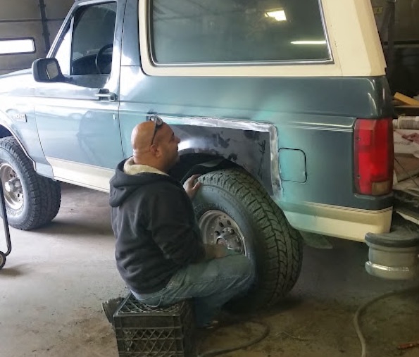 Auto body repair on a truck at Frank's