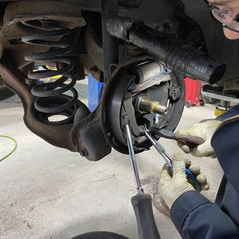 Close-up of brake and suspension work